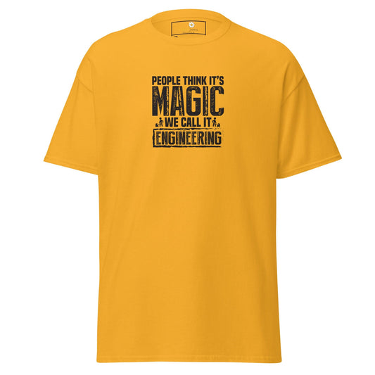 Yellow t-shirt with ’People think it’s magic, we call it engineering’ text.
